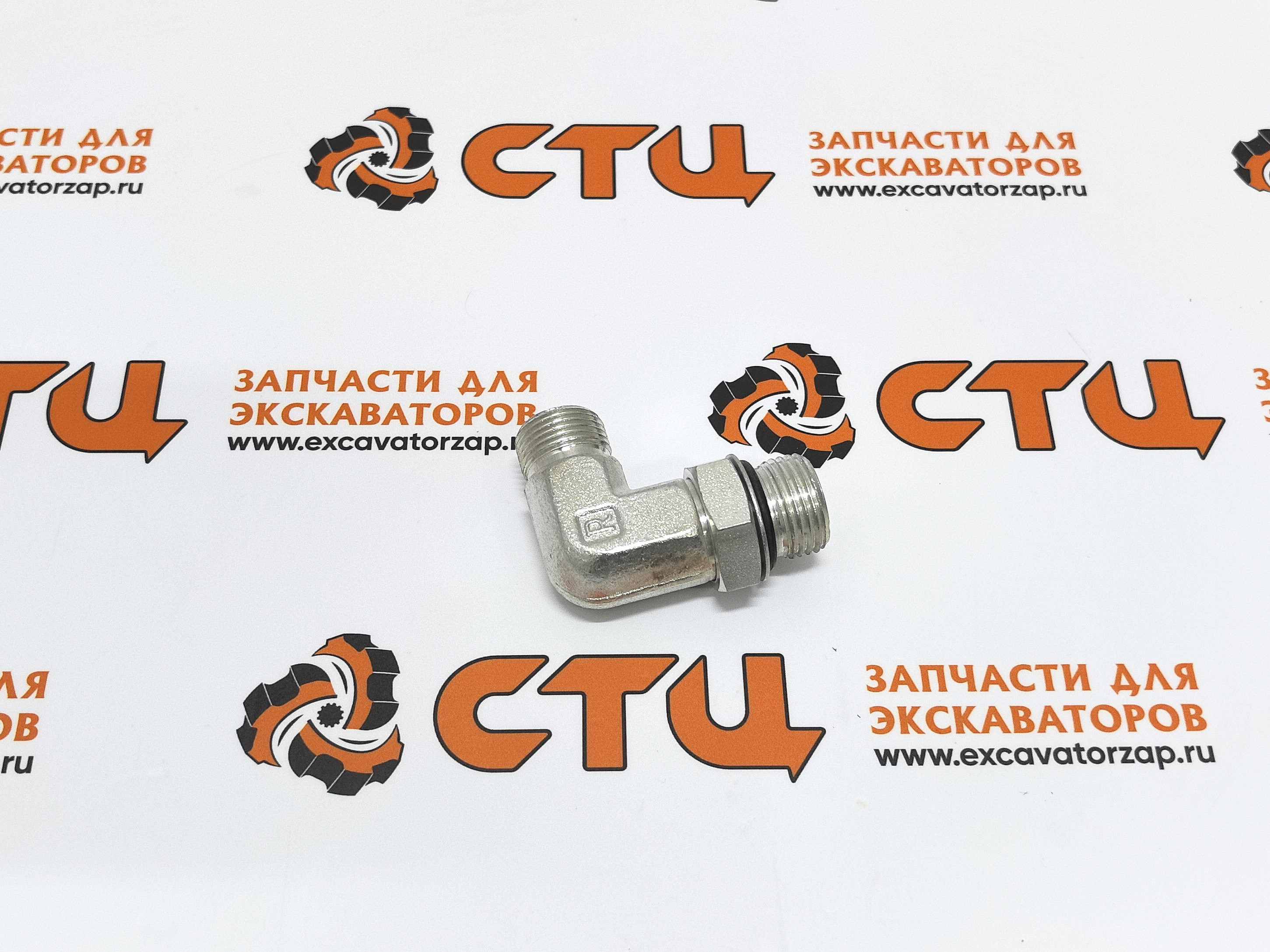 Штуцер (уголок) VOE935073 гидролинии фронтального ковша экскаватора погрузчика Volvo BL61, BL71